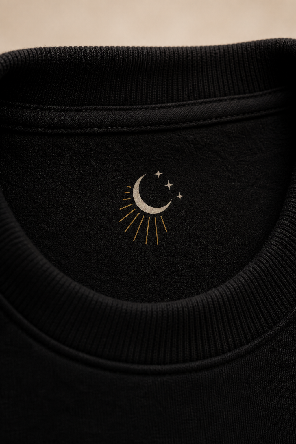 Close-up of the Handoff Atlas hidden inner-neckline celestial mark